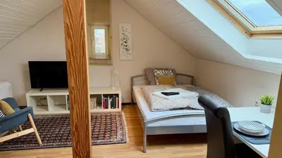 Ein Bett oder Betten in einem Zimmer der Unterkunft Domus Palatina FeWo & Business Apartments