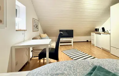 Ein Bett oder Betten in einem Zimmer der Unterkunft Domus Palatina FeWo & Business Apartments