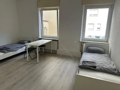 Ein Bett oder Betten in einem Zimmer der Unterkunft Monteurswohnung Neustadt an der Weinstraße