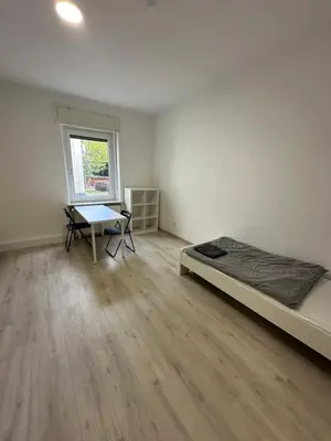 Ein Bett oder Betten in einem Zimmer der Unterkunft Monteurswohnung Neustadt an der Weinstraße