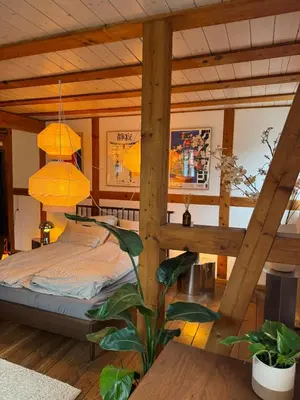 Ein Bett oder Betten in einem Zimmer der Unterkunft Herzstück 1526 - Ihre Ferienwohnung im Fachwerkhaus direkt in der Altstadt