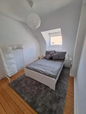 Ein Bett oder Betten in einem Zimmer der Unterkunft Süße Marie 6