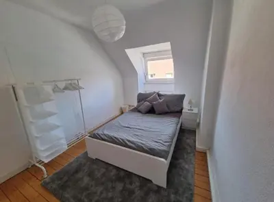 Ein Bett oder Betten in einem Zimmer der Unterkunft Süße Marie 6