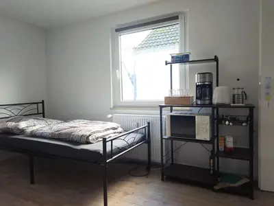 Ein Bett oder Betten in einem Zimmer der Unterkunft Modern Appartement near city of Darmstadt