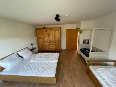 Ein Bett oder Betten in einem Zimmer der Unterkunft Mühlenhof am Pferdestall