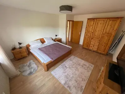 Ein Bett oder Betten in einem Zimmer der Unterkunft Mühlenhof am Pferdestall