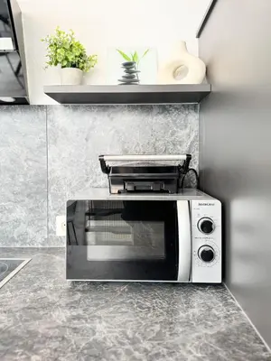 Küche/Küchenzeile in der Unterkunft Urban Stay Karlsruhe Akademie frieden apartments