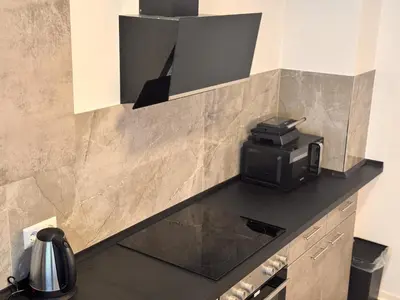 Küche/Küchenzeile in der Unterkunft Modern City Apartment Pforzheim frieden apartments