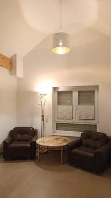 Ein Sitzbereich in der Unterkunft Ferienwohnung im Heckgewann