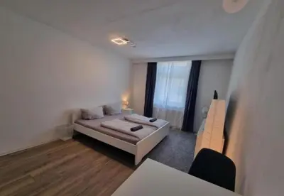 Ein Bett oder Betten in einem Zimmer der Unterkunft Süße Marie 10