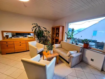 Ein Sitzbereich in der Unterkunft Geräumige Wohnung mit 4 Betten und Balkon