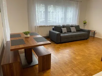 Ein Sitzbereich in der Unterkunft Appartement am Pfühlpark Parkplatz Küche Wlan Balkon