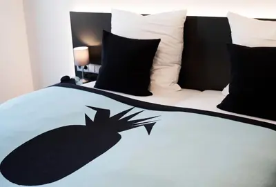 Ein Bett oder Betten in einem Zimmer der Unterkunft Mood Studios