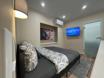 Ein Bett oder Betten in einem Zimmer der Unterkunft Lumio Apartment 3