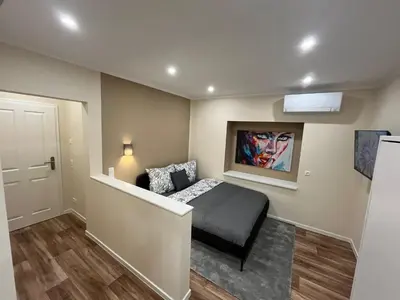 Ein Sitzbereich in der Unterkunft Lumio Apartment 3