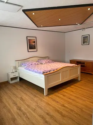 Ein Bett oder Betten in einem Zimmer der Unterkunft Zum Talblick