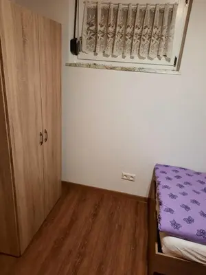 Ein Bett oder Betten in einem Zimmer der Unterkunft Zum Talblick