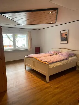 Ein Bett oder Betten in einem Zimmer der Unterkunft Zum Talblick