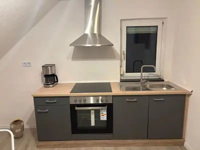 Küche/Küchenzeile in der Unterkunft Moderne Apartments Meimsheim bis 5 Personen Nahe Tripsdrill