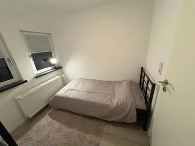 Ein Bett oder Betten in einem Zimmer der Unterkunft Moderne Apartments Meimsheim bis 5 Personen Nahe Tripsdrill