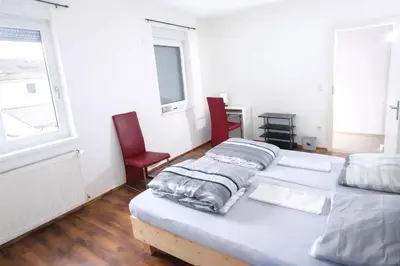Ein Bett oder Betten in einem Zimmer der Unterkunft Homestay Dietzenbach, Frankfurt am Main, Rhein-Main, Offenbach am Main