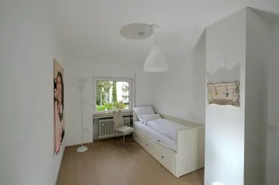 Ein Bett oder Betten in einem Zimmer der Unterkunft Ferienhaus für Familien und Reisegruppen bei Heidelberg