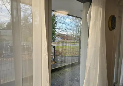 Ein Garten an der Unterkunft Modern Living nearby RheinHafen mit Balkon und Parken - Apolonia Living