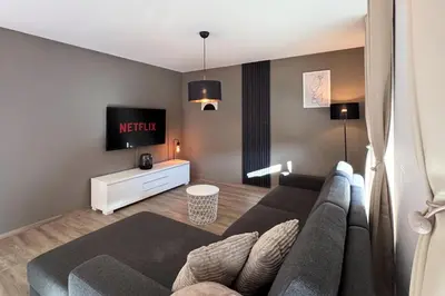 TV/Unterhaltungsangebot in der Unterkunft Modernes 118qm Haus für Ferien und Arbeit