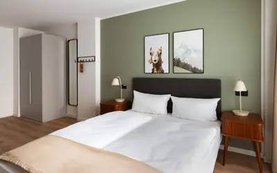 Ein Bett oder Betten in einem Zimmer der Unterkunft Limehome Mannheim City Center
