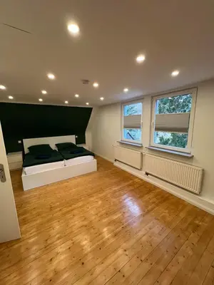 Ein Bett oder Betten in einem Zimmer der Unterkunft Ferienhaus mit Trifelsblick