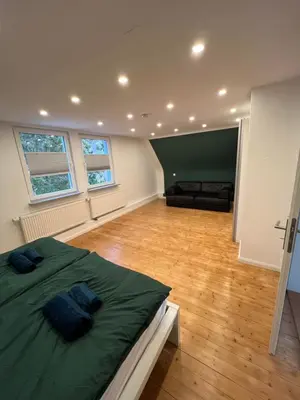 Ein Bett oder Betten in einem Zimmer der Unterkunft Ferienhaus mit Trifelsblick