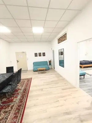 Ein Sitzbereich in der Unterkunft Apartment with bedroom for up to 4 people