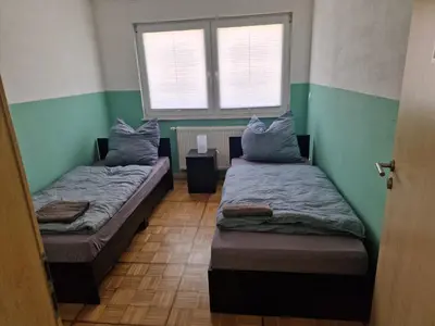 Ein Bett oder Betten in einem Zimmer der Unterkunft Wolfskraft
