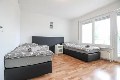 Ein Bett oder Betten in einem Zimmer der Unterkunft nJoy! Business Apartment Neckarsulm - nähe Audi & Balkon
