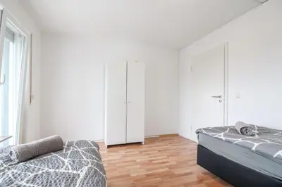 Ein Bett oder Betten in einem Zimmer der Unterkunft nJoy! Business Apartment Neckarsulm - nähe Audi & Balkon