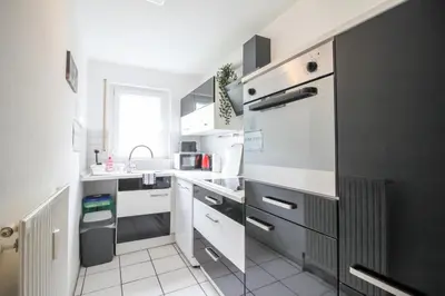 Küche/Küchenzeile in der Unterkunft nJoy! Business Apartment Neckarsulm - nähe Audi & Balkon
