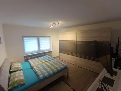 Ein Bett oder Betten in einem Zimmer der Unterkunft Ferienwohnung unter der Burg