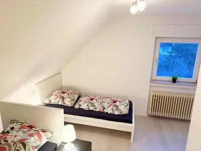 Ein Bett oder Betten in einem Zimmer der Unterkunft Vollausgestattete Wohnung für Selbstversorger