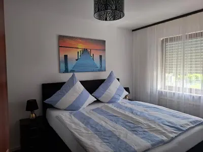 Ein Bett oder Betten in einem Zimmer der Unterkunft First floor Apartment Mainhausen