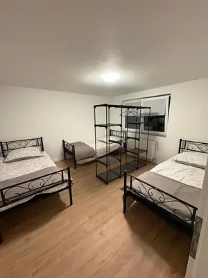 Ein Bett oder Betten in einem Zimmer der Unterkunft Moderne Unterkunft für bis zu 5 Personen -5 Betten