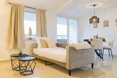 Ein Bett oder Betten in einem Zimmer der Unterkunft Moderne 2-Zimmer Wohnung - kostenloser Parkplatz