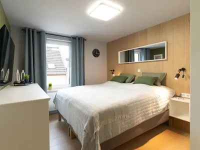 Ein Bett oder Betten in einem Zimmer der Unterkunft Holiday Home House 756 Mainz by Interhome