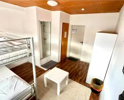 Ein Bett oder Betten in einem Zimmer der Unterkunft RoomZ Hostel am Hockenheimring