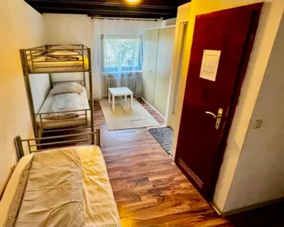 Ein Bett oder Betten in einem Zimmer der Unterkunft RoomZ Hostel am Hockenheimring