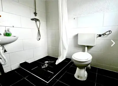 Ein Badezimmer in der Unterkunft RoomZ Hostel am Hockenheimring