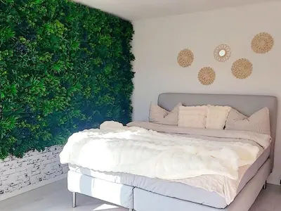 Ein Bett oder Betten in einem Zimmer der Unterkunft Apartment Vineyard-Suites FeWo by Interhome