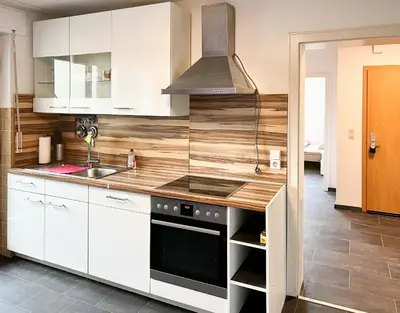Küche/Küchenzeile in der Unterkunft Großzügige OG Ferienwohnung in Linkenheim frieden apartments