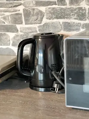Kaffee-/Teezubehör in der Unterkunft Großzügige OG Ferienwohnung in Linkenheim frieden apartments
