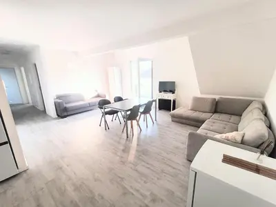 Ein Sitzbereich in der Unterkunft Apartment mit Balkon