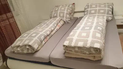 Ein Bett oder Betten in einem Zimmer der Unterkunft Toumaka-TopLage